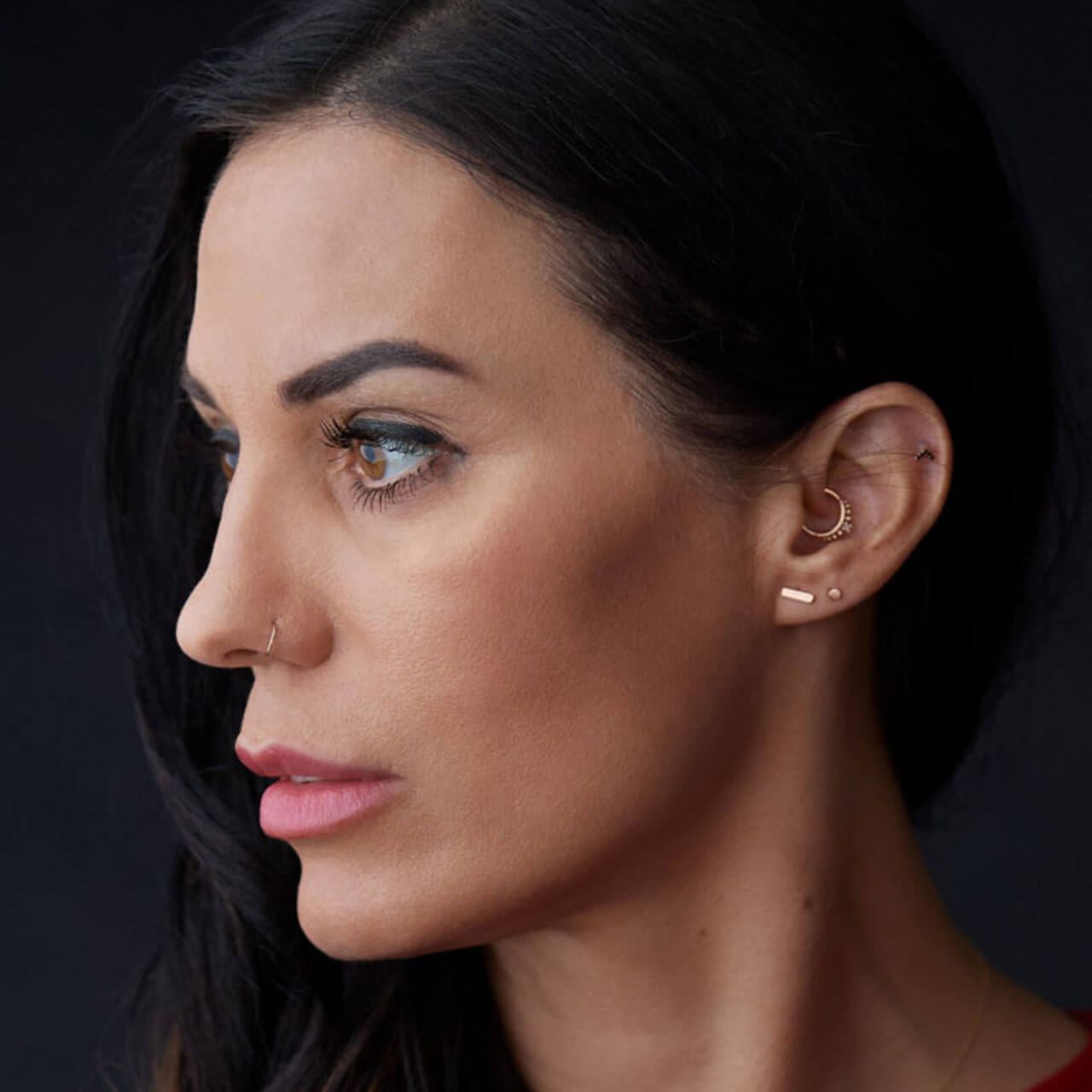 After: Portrait of a dark-haired woman with a calm expression