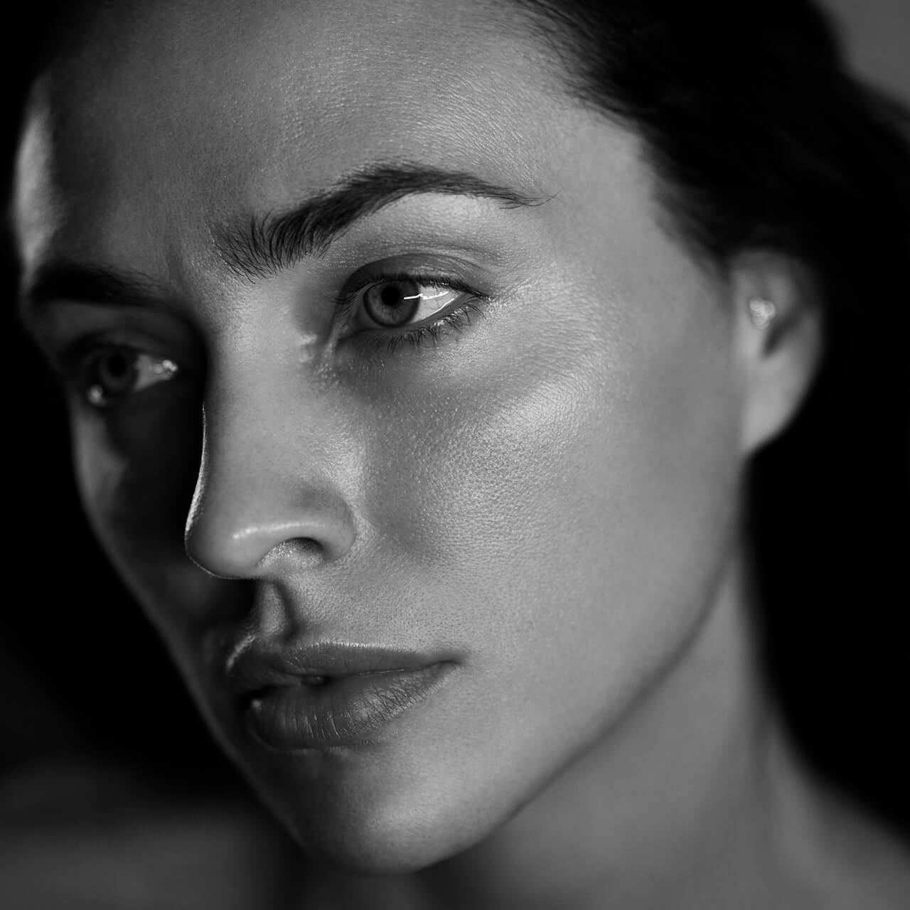 After: Black-and-white close-up portrait of a woman’s face