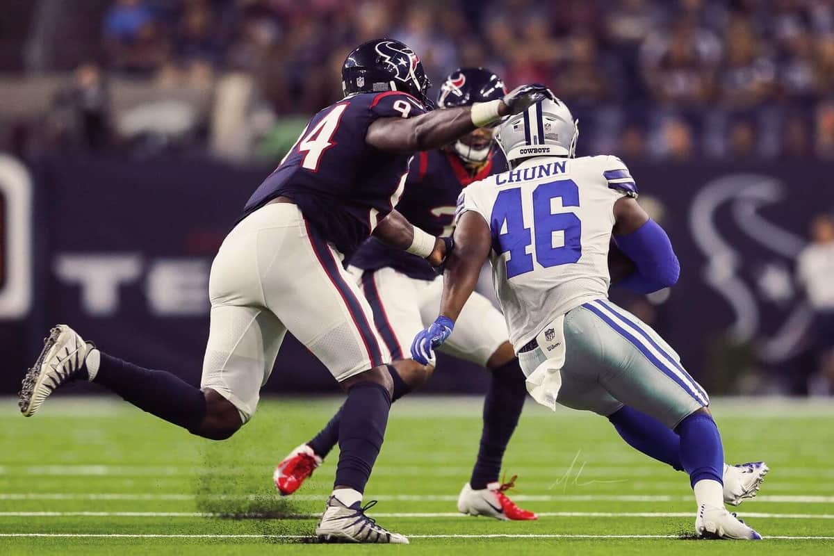 Photo from the article “Michael Moon Shows Us What It Takes To Photograph The NFL”